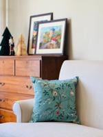 Designer cushion with custom wallpaper print