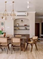 Modern dining room interior with accent wallpaper